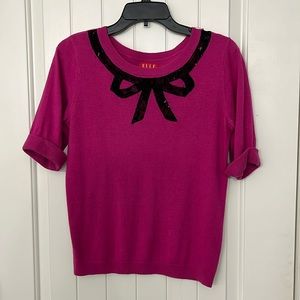 Elle hot pink sweater with black lace bow